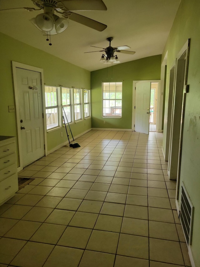 1989 Juniper Lake Rd, Defuniak Springs, FL 32433 - empty room featuring a ceiling fan, light tile patterned floors, and baseboards