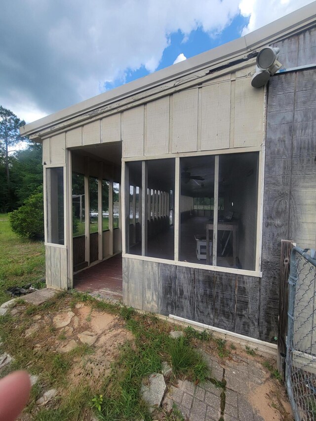 1989 Juniper Lake Rd, Defuniak Springs, FL 32433 - view of side of property featuring a sunroom