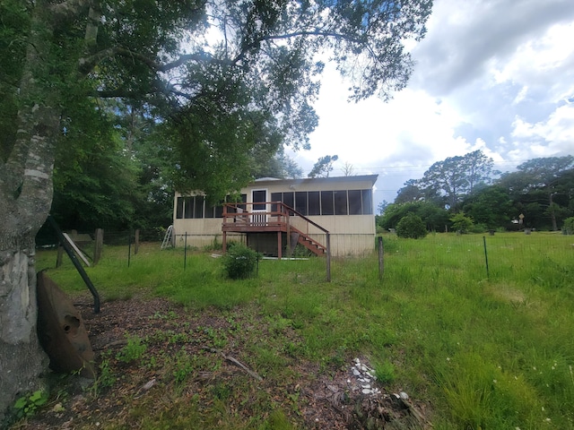 1989 Juniper Lake Rd, Defuniak Springs, FL 32433 - back of property with a sunroom and stairway