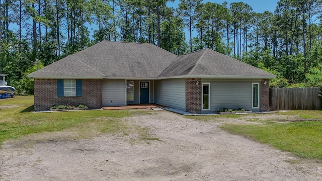241 Mullet Dr, Freeport, FL 32439 - single story home featuring a shingled roof and brick siding