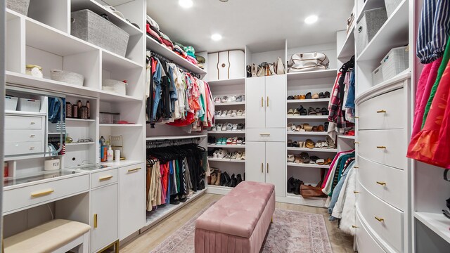 241 Mullet Dr, Freeport, FL 32439 - spacious closet featuring light wood finished floors