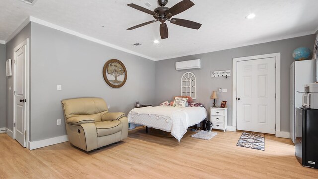 241 Mullet Dr, Freeport, FL 32439 - bedroom with a wall mounted AC, light wood-style flooring, ornamental molding, baseboards, and recessed lighting