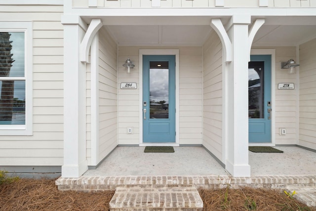 278 Dockside Dr, Port St Joe, FL 32456 - view of exterior entry featuring covered porch
