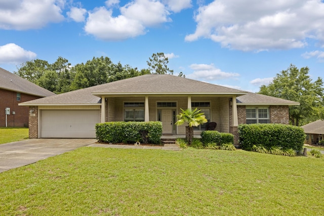 201 Pinque Coat Ct, Crestview, FL 32536 - view of front facade with concrete driveway, brick siding, a garage, and covered porch