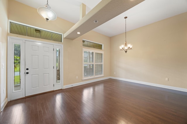 201 Pinque Coat Ct, Crestview, FL 32536 - entrance foyer featuring dark wood-style flooring and a chandelier
