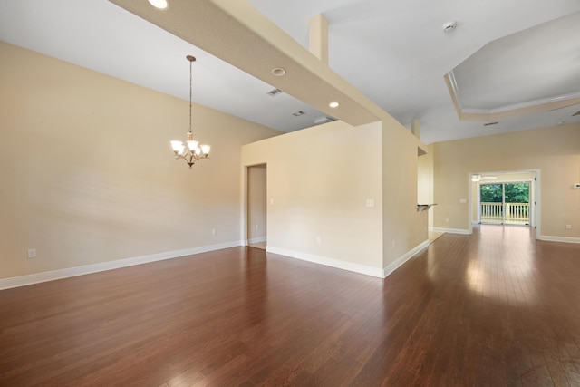 201 Pinque Coat Ct, Crestview, FL 32536 - empty room with hardwood / wood-style floors, a chandelier, a smoke detector, and a high ceiling