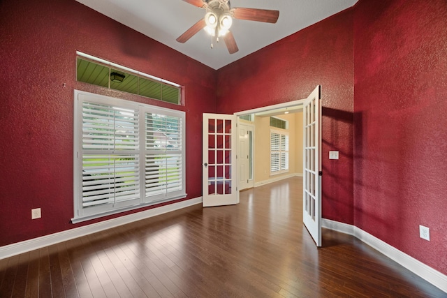 201 Pinque Coat Ct, Crestview, FL 32536 - unfurnished room featuring french doors, hardwood / wood-style flooring, a ceiling fan, and a textured wall