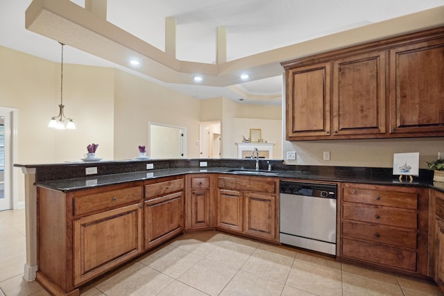 201 Pinque Coat Ct, Crestview, FL 32536 - kitchen with stainless steel dishwasher, brown cabinets, light tile patterned floors, decorative light fixtures, and recessed lighting