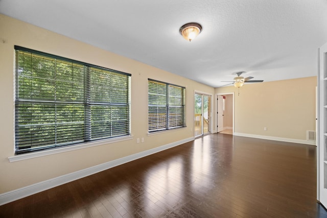 201 Pinque Coat Ct, Crestview, FL 32536 - unfurnished room featuring dark wood-style flooring and ceiling fan