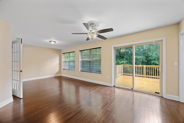 201 Pinque Coat Ct, Crestview, FL 32536 - empty room featuring ceiling fan and dark wood-style flooring
