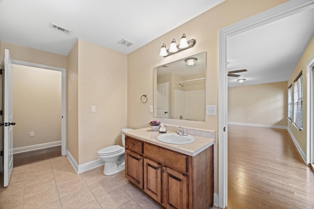 201 Pinque Coat Ct, Crestview, FL 32536 - full bath featuring vanity, wood finished floors, and ceiling fan