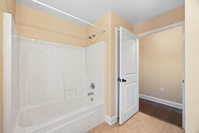 201 Pinque Coat Ct, Crestview, FL 32536 - bathroom featuring shower / tub combination and tile patterned floors