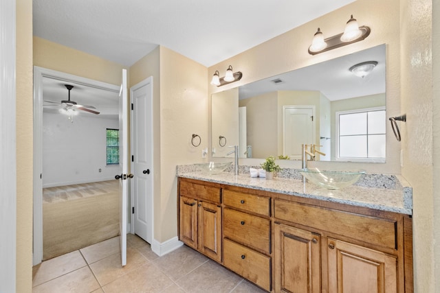 201 Pinque Coat Ct, Crestview, FL 32536 - full bathroom with double vanity, ceiling fan, plenty of natural light, and tile patterned floors