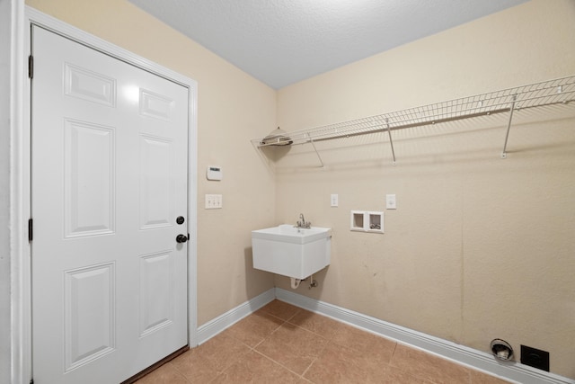 201 Pinque Coat Ct, Crestview, FL 32536 - laundry room with hookup for a washing machine and light tile patterned flooring