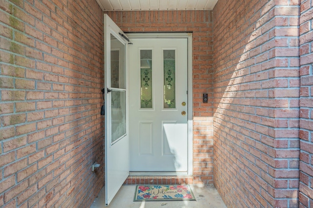 407 Tobago Ct, Crestview, FL 32536 - view of exterior entry featuring brick siding