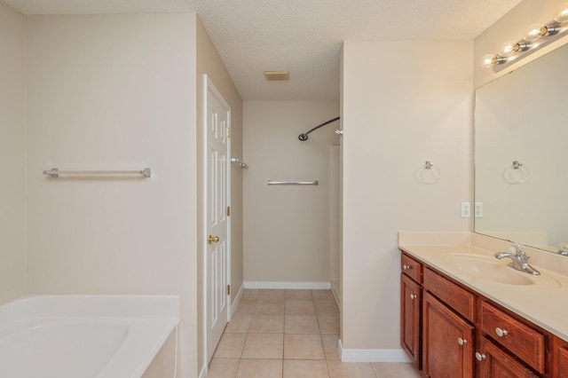 407 Tobago Ct, Crestview, FL 32536 - bathroom featuring a tub, vanity, tile patterned floors, a shower, and baseboards