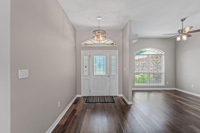 2741 Creeks Edge Ln, Navarre, FL 32566 - entrance foyer featuring dark wood-style flooring, baseboards, and a chandelier