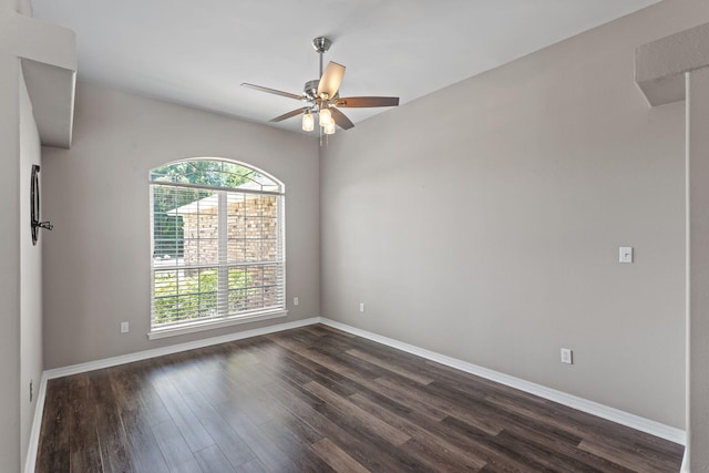 2741 Creeks Edge Ln, Navarre, FL 32566 - spare room featuring ceiling fan, dark wood-style floors, and baseboards