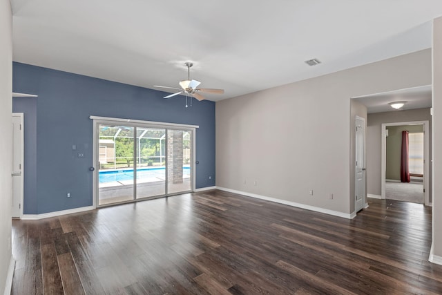 2741 Creeks Edge Ln, Navarre, FL 32566 - unfurnished room featuring a ceiling fan, dark wood-type flooring, and baseboards
