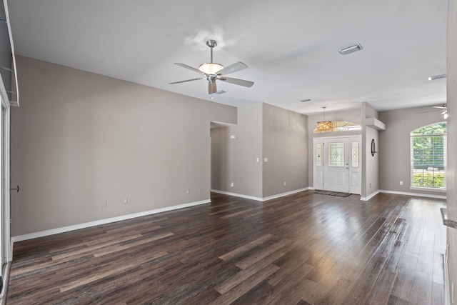 2741 Creeks Edge Ln, Navarre, FL 32566 - unfurnished living room featuring ceiling fan, dark wood finished floors, and baseboards