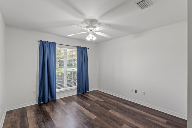2741 Creeks Edge Ln, Navarre, FL 32566 - unfurnished room featuring dark wood-style floors, ceiling fan, and baseboards