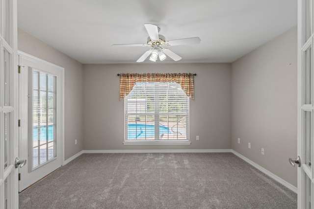 2741 Creeks Edge Ln, Navarre, FL 32566 - unfurnished room featuring plenty of natural light, carpet flooring, and baseboards