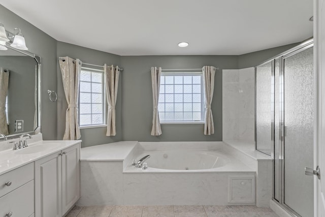 2741 Creeks Edge Ln, Navarre, FL 32566 - full bathroom featuring vanity, healthy amount of natural light, a garden tub, a stall shower, and recessed lighting