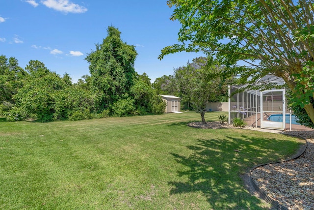 2741 Creeks Edge Ln, Navarre, FL 32566 - view of yard featuring an outdoor pool and a lanai