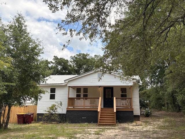 914 Georgia St, Crestview, FL 32536 - view of front of property with a porch and metal roof