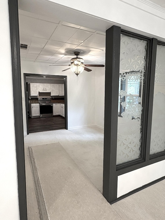 914 Georgia St, Crestview, FL 32536 - hallway with baseboards, light carpet, and a drop ceiling