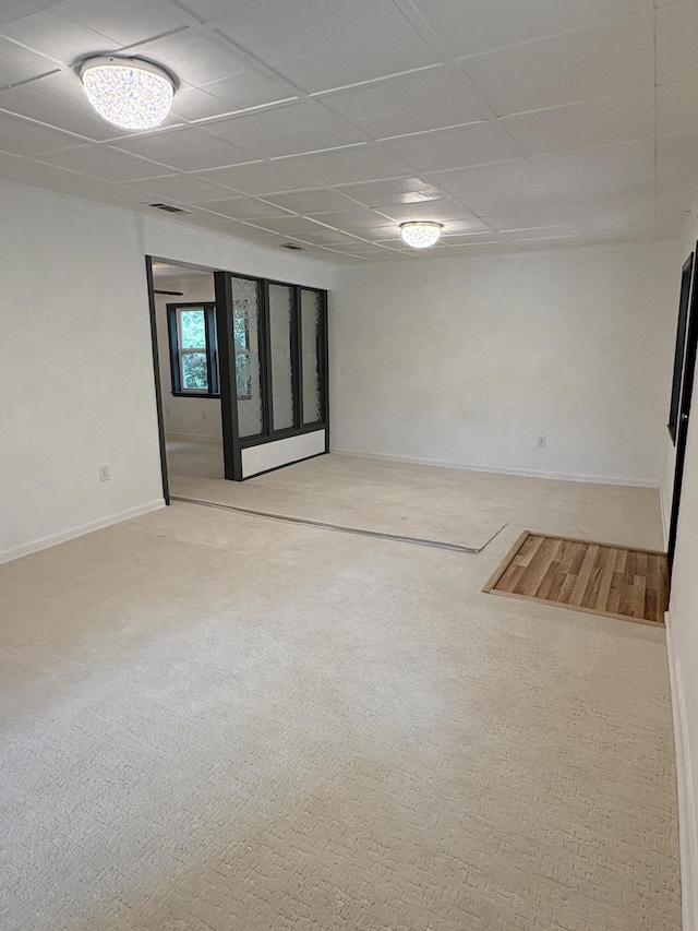914 Georgia St, Crestview, FL 32536 - carpeted empty room featuring a paneled ceiling and baseboards