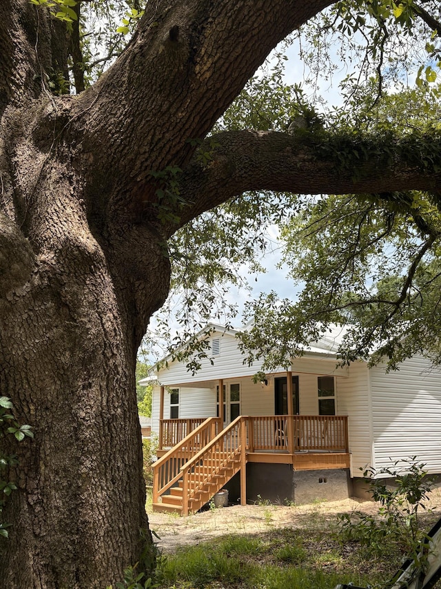 914 Georgia St, Crestview, FL 32536 - back of house with stairs and a wooden deck
