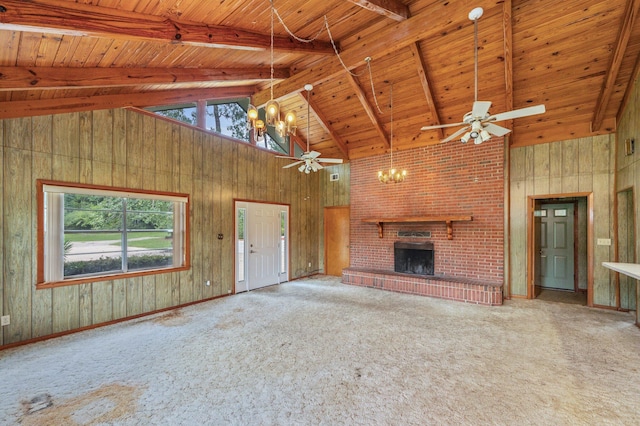 2226 W James Lee Blvd, Crestview, FL 32536 - unfurnished living room featuring a chandelier, a ceiling fan, a fireplace, a wooden ceiling with exposed beams, and high vaulted ceiling