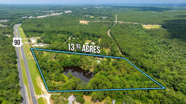 2226 W James Lee Blvd, Crestview, FL 32536 - aerial view of property's location featuring property boundaries highlighted and a large body of water