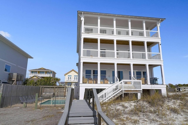 330 Tang O Mar Dr, Destin, FL 32550 - rear view of house featuring a balcony
