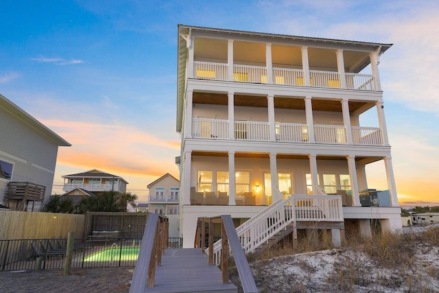 330 Tang O Mar Dr, Destin, FL 32550 - rear view of property featuring a balcony and stairway