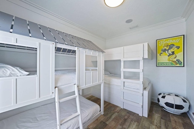 330 Tang O Mar Dr, Destin, FL 32550 - bedroom with crown molding and wood finished floors