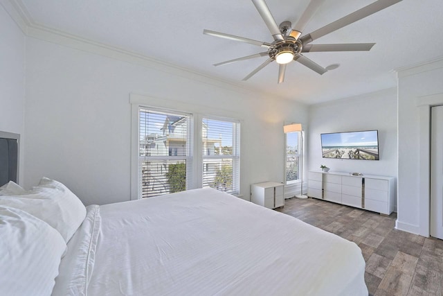330 Tang O Mar Dr, Destin, FL 32550 - bedroom featuring ornamental molding, wood finished floors, and ceiling fan