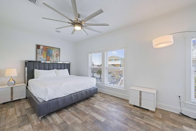 330 Tang O Mar Dr, Destin, FL 32550 - bedroom featuring crown molding and wood finished floors
