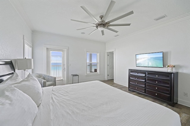 330 Tang O Mar Dr, Destin, FL 32550 - bedroom with access to outside, dark wood-type flooring, crown molding, and ceiling fan