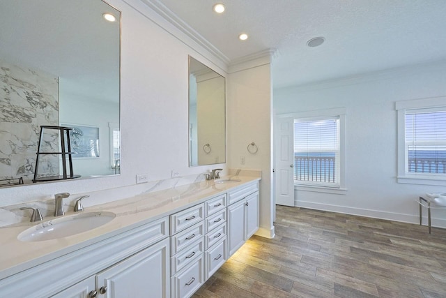 330 Tang O Mar Dr, Destin, FL 32550 - bathroom featuring ornamental molding, double vanity, wood finished floors, and recessed lighting