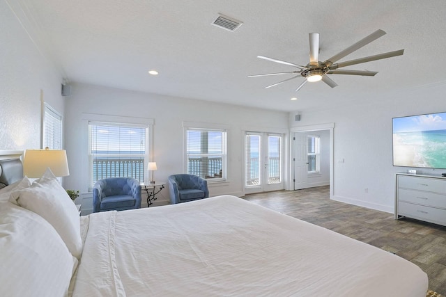 330 Tang O Mar Dr, Destin, FL 32550 - bedroom with wood finished floors, multiple windows, recessed lighting, a ceiling fan, and access to exterior