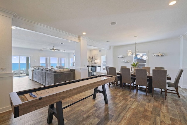 330 Tang O Mar Dr, Destin, FL 32550 - recreation room with crown molding, dark wood-style floors, ceiling fan, recessed lighting, and a chandelier