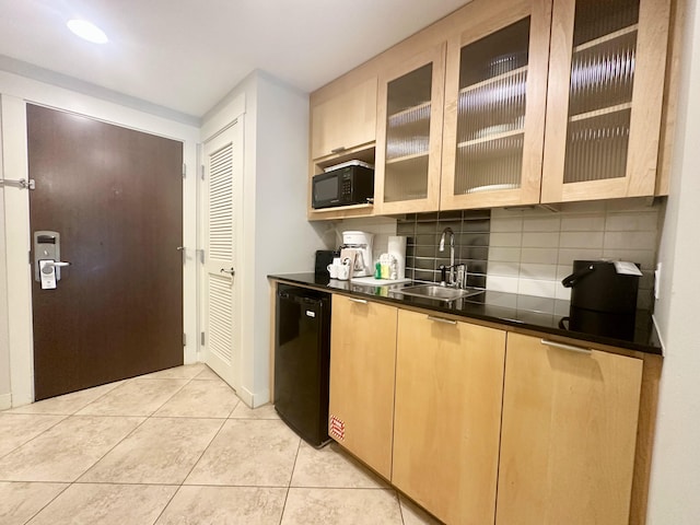 9700 Grand Sandestin Blvd Unit 4215, Miramar Beach, FL 32550 - kitchen with black microwave, dishwashing machine, tasteful backsplash, dark countertops, and light tile patterned flooring