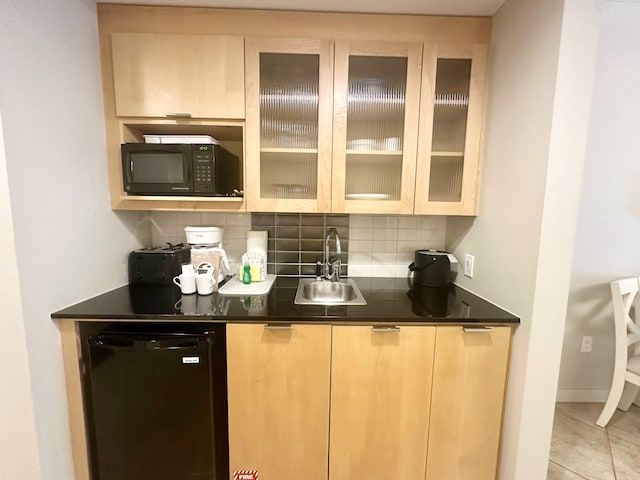 9700 Grand Sandestin Blvd Unit 4215, Miramar Beach, FL 32550 - bar featuring black microwave, tasteful backsplash, fridge, and light tile patterned floors