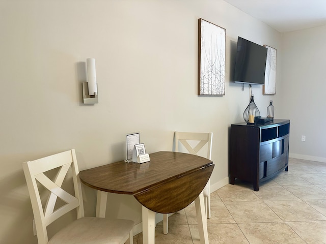 9700 Grand Sandestin Blvd Unit 4215, Miramar Beach, FL 32550 - dining space with baseboards and light tile patterned floors
