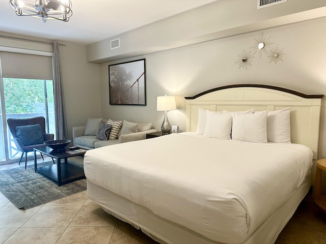 9700 Grand Sandestin Blvd Unit 4215, Miramar Beach, FL 32550 - bedroom with a chandelier and light tile patterned floors