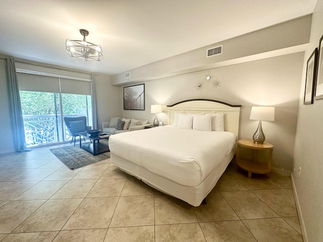 9700 Grand Sandestin Blvd Unit 4215, Miramar Beach, FL 32550 - bedroom with access to exterior, light tile patterned flooring, and a chandelier