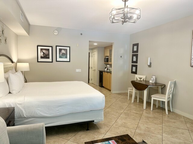 9700 Grand Sandestin Blvd Unit 4215, Miramar Beach, FL 32550 - bedroom featuring a chandelier and light tile patterned floors