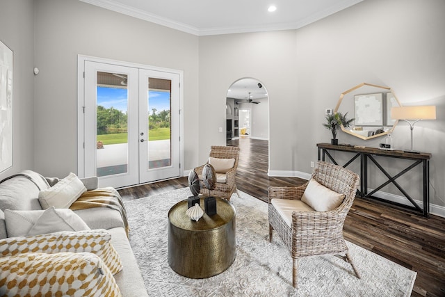 203 Landings Dr, Lynn Haven, FL 32444 - living room featuring crown molding, wood finished floors, french doors, baseboards, and arched walkways